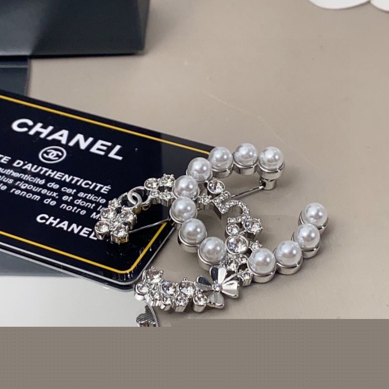 Ch*el brooches
